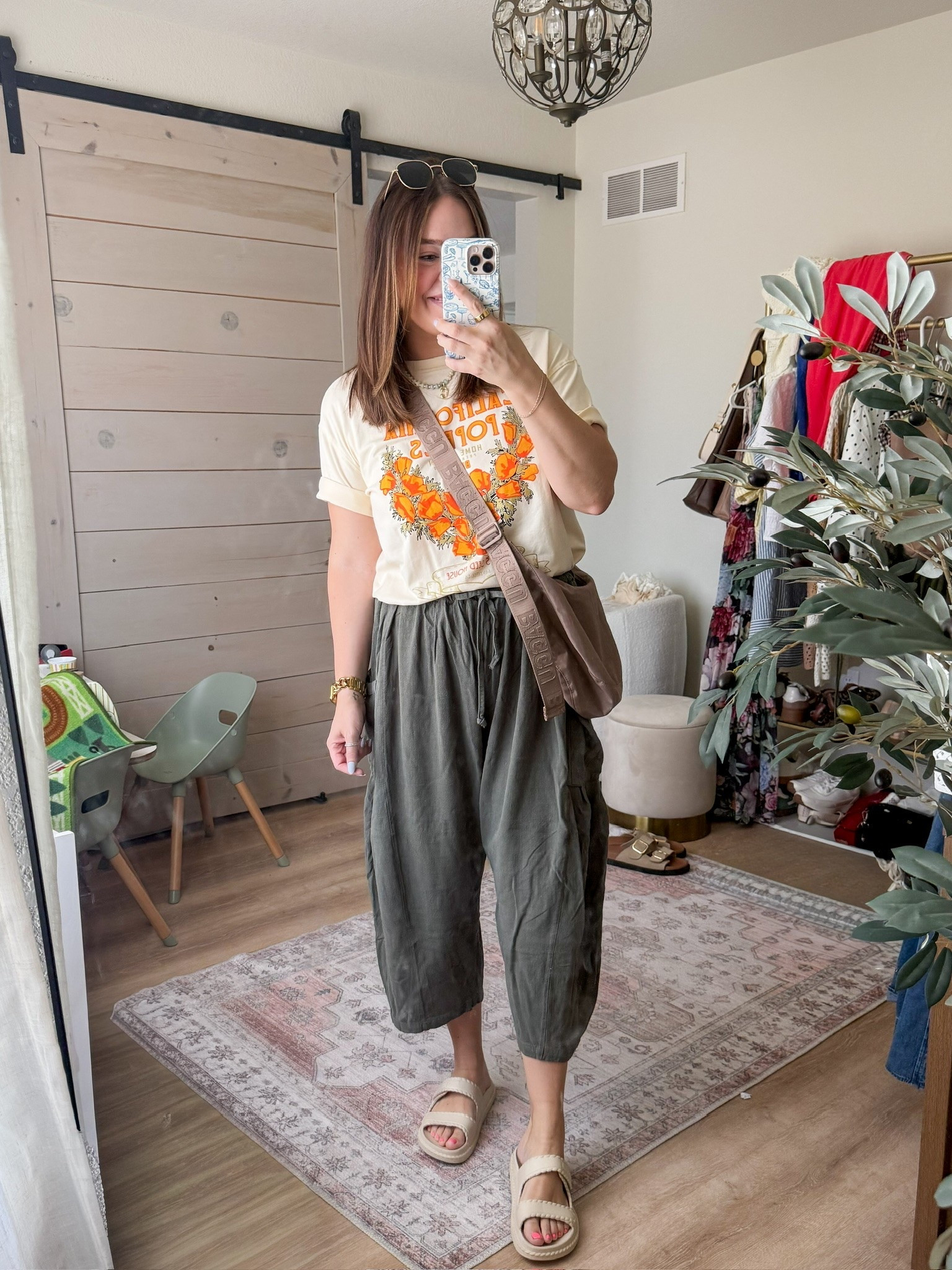 Low effort mom outfit // love a graphic tee paired with comfy soft tummy approved pants! Wore these pregnant and postpartum and have them in multiple colors // wearing size large in top and bottoms

#LTKootd #LTKmomlife #LTKMidsize