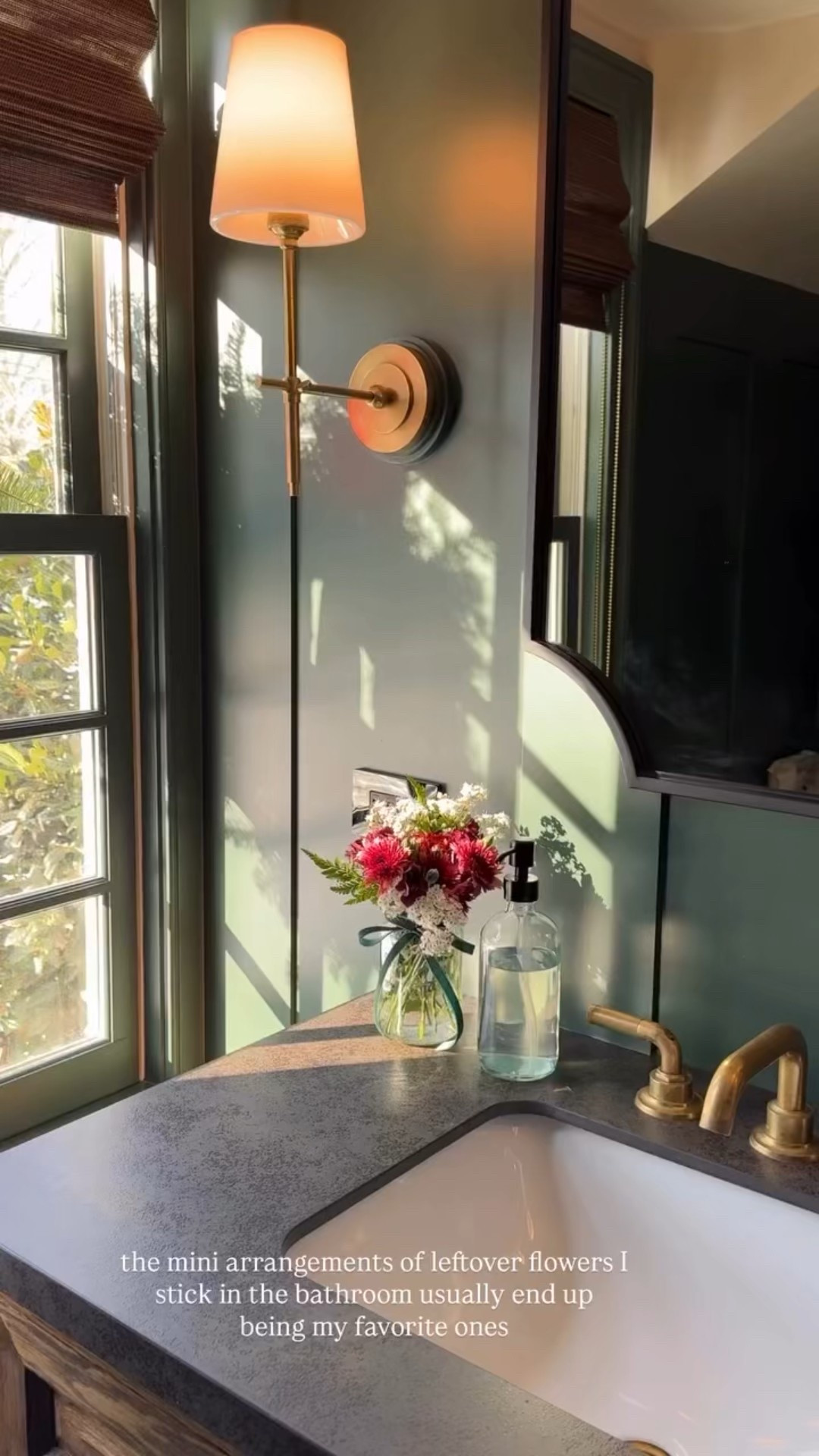 A mini floral arrangement for the bathroom 💐 paint color is BM crisp romaine 

bathroom sconce, amazing soap dispenser, bathroom details 

#LTKHome #LTKFindsUnder50