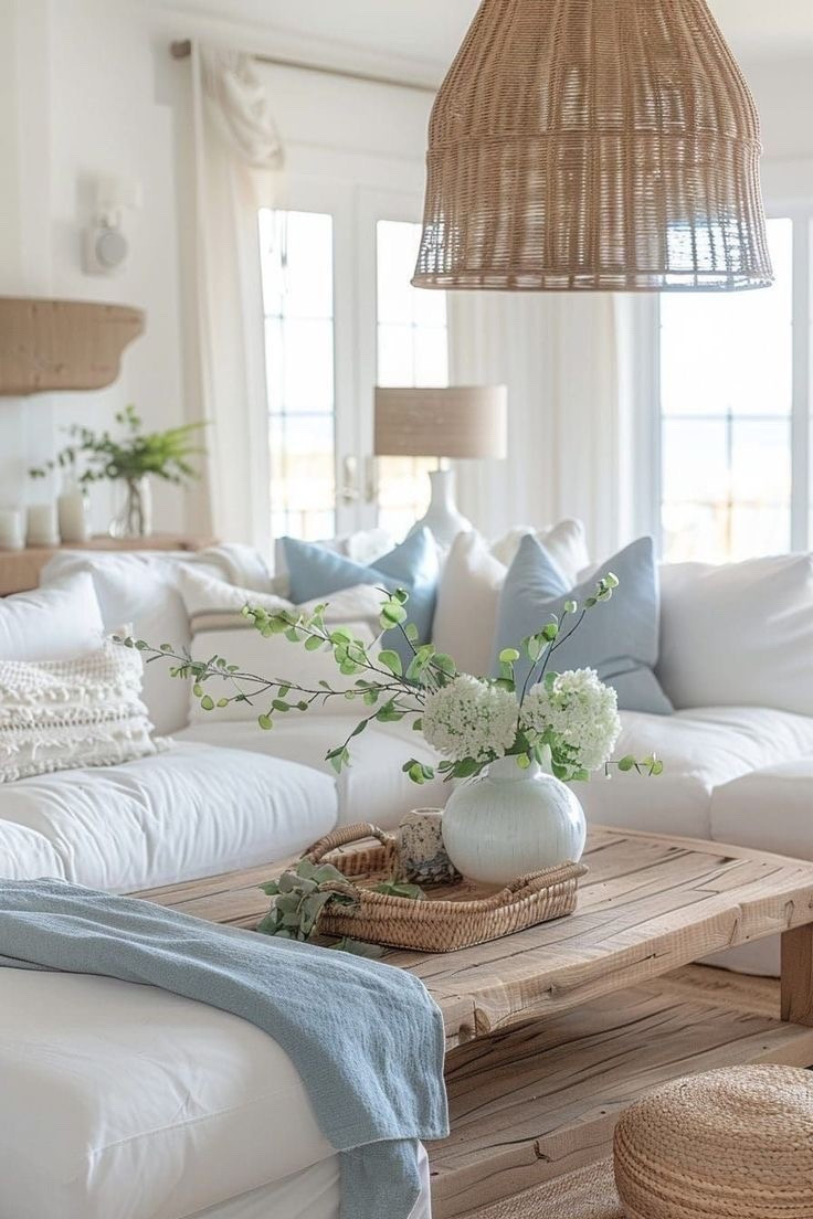 the perfect farmhouse living room setup: calming blue and white accents combined with inviting rattan and oak statements to warm up the space are calling for hosting of friend and family gathering, a game night, or a girls activity night <3

tip for purchasing a white couch, from a designer and a white couch owner: make sure to either purchase couches with performance fabric or removable cushion covers to make your purchase last longer and looking fresh the entire time you own it!

photo credit: brooke harter via pinterest

#LTKHome #LTKSaleAlert #LTKSeasonal