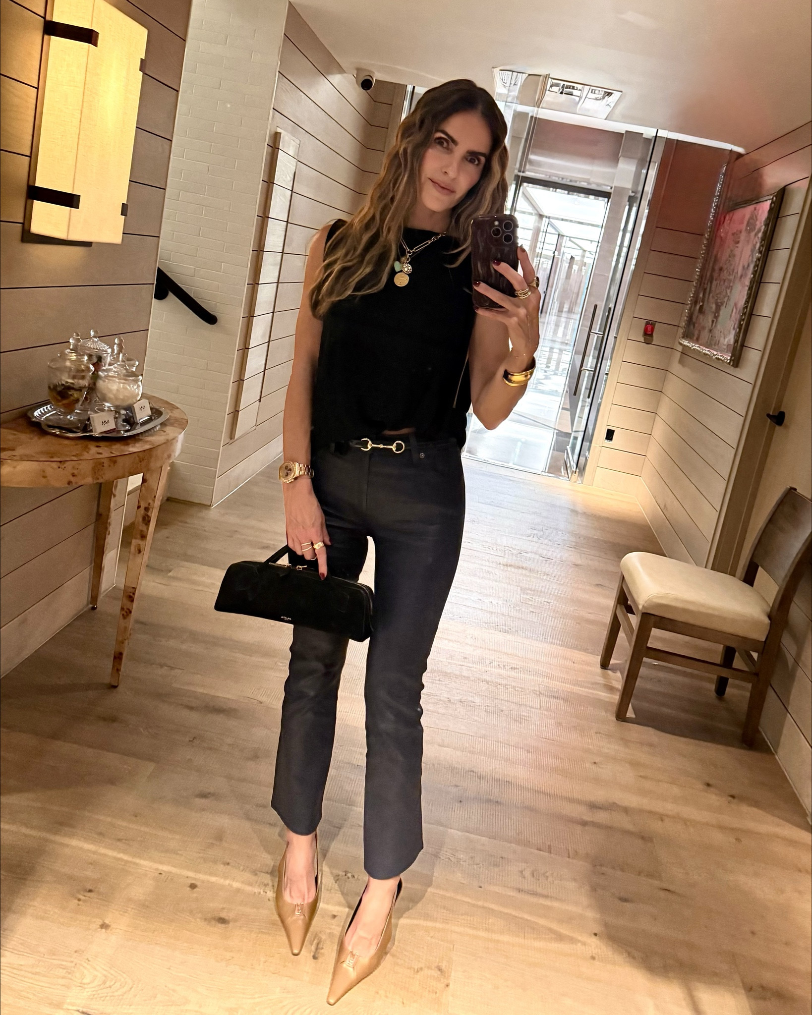 saturday night date night look of the night 🚨my navy leather pants come in 5 color ways! 

they are incredible the fit is simply perfection! 

i sized down bc i like a tighter fit but if between sizes get your normal size (im wearing a 24) 

+ shop the oh so chic black blouse that also comes in 2 other colors & is also on sale rn! 

i’m wearing x-small runs big 

+ my fav bag & heels too! 


#LTKShoeCrush #LTKStyleTip #LTKItBag