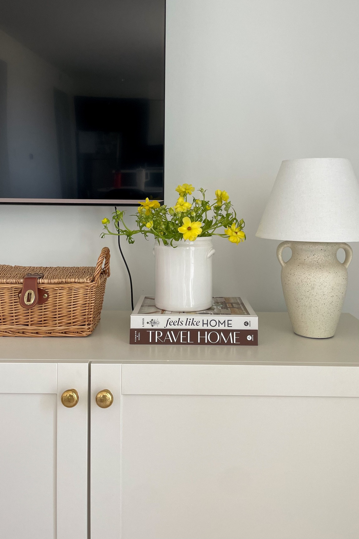 Coffee table books, unlacquered brass hardware/knobs, tv console decor, living room inspo 

#LTKunder50 #LTKhome
