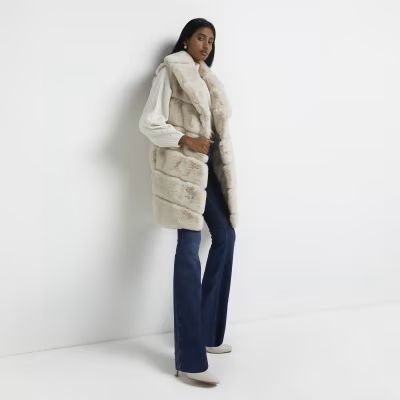 Cream faux fur panelled gilet | River Island (UK & IE)