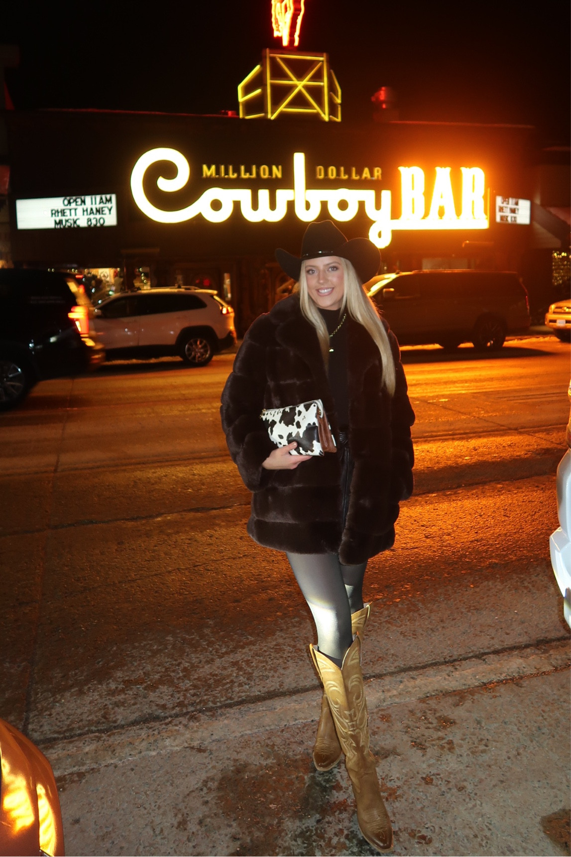 Jackson Hole Outfit🤎 Hat is Cody James, fur jacket is Max Azaria, fleece lined tights, aritzia leather skirt, Wetkiss boots, Jen & Co. cow print purse, 12th tribe cross pendant

#LTKBeauty #LTKTravel #LTKStyleTip