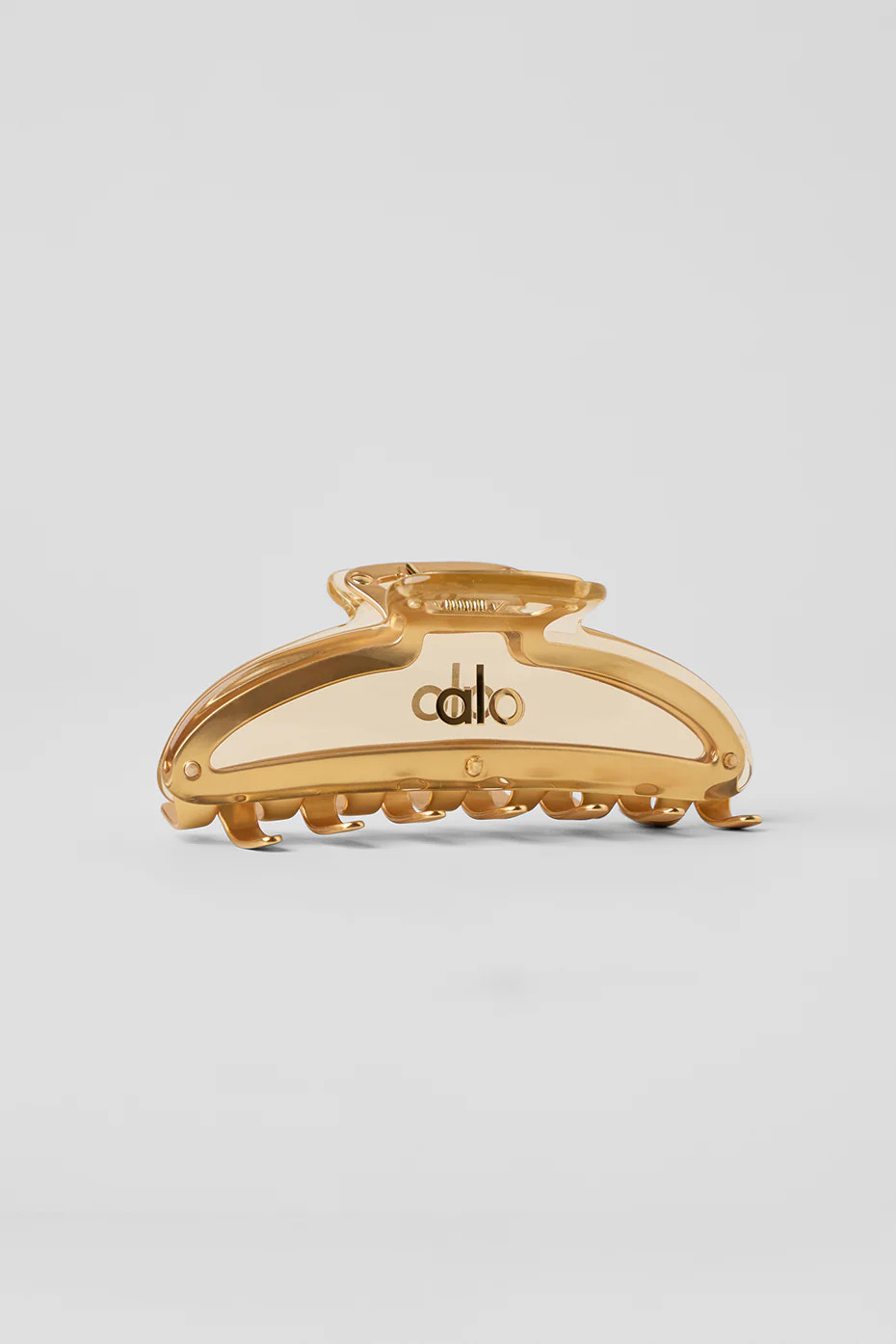 Alo YogaÂ® | Acrylic Illusion Claw Clip in Clear/Gold | Alo Yoga (US)