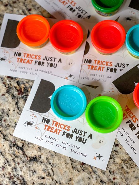 This is the cutest party favor or Halloween happy for your child's classmates. This customizable printout is $4 on Etsy. Print out the cards on 90-100 lb cardstock. Cut along the lines to get four cards. Then add three glue dots to the bottom of a one oz container of playdoh and attach it on the designated circles. These are so cute and so fun for Halloween!

#LTKkids #LTKHalloween