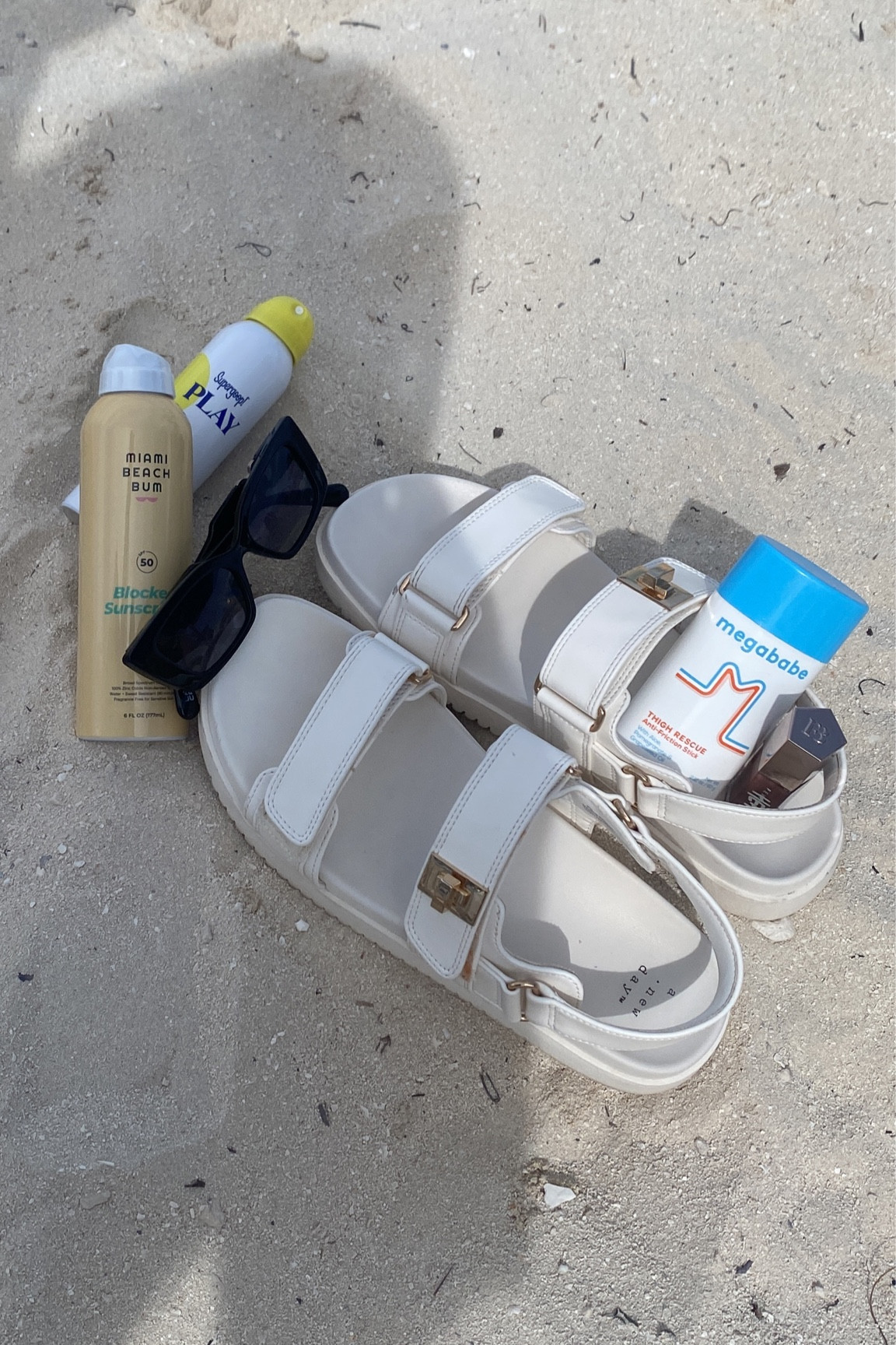 Beach day summer essentials! Sunscreen with high SPF, comfy yet cute sandals from Target, product to prevent thigh chafing & a universal lippy & sunglasses ✨🤍 

#LTKSwim #LTKBeauty #LTKSeasonal