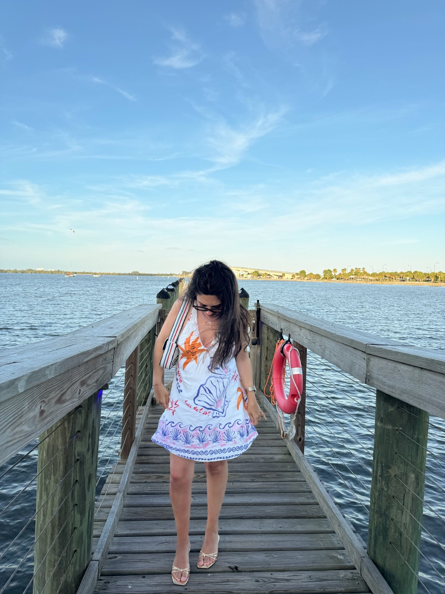 The ultimate colorful summer mini dress 🌞🐚🌊 I love the coastal-inspired print, easy swingy silhouette, and pops of orange + blue. Paired it with metallic gold sandals, a fun statement tote, and sunnies for an easy vacation dinner or waterfront look.

Perfect for: summer vacation outfits, beach dinner outfits, resort wear, coastal style, colorful summer dresses, vacation mini dresses, beach town outfits, summer date night & warm weather travel ✨

#LTKootd #LTKSeasonal #LTKTravel
