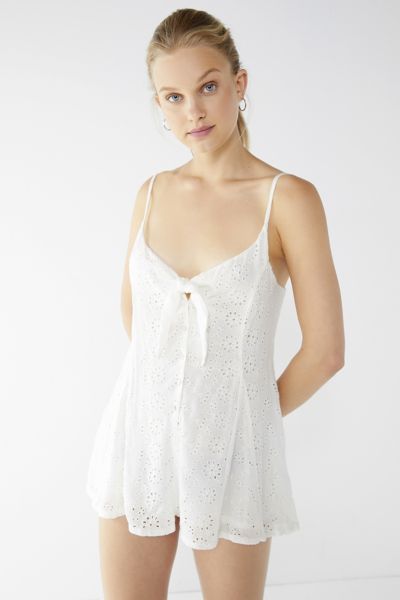 UO Nova Eyelet Tie-Front Romper - White XS at Urban Outfitters | Urban Outfitters (US and RoW)