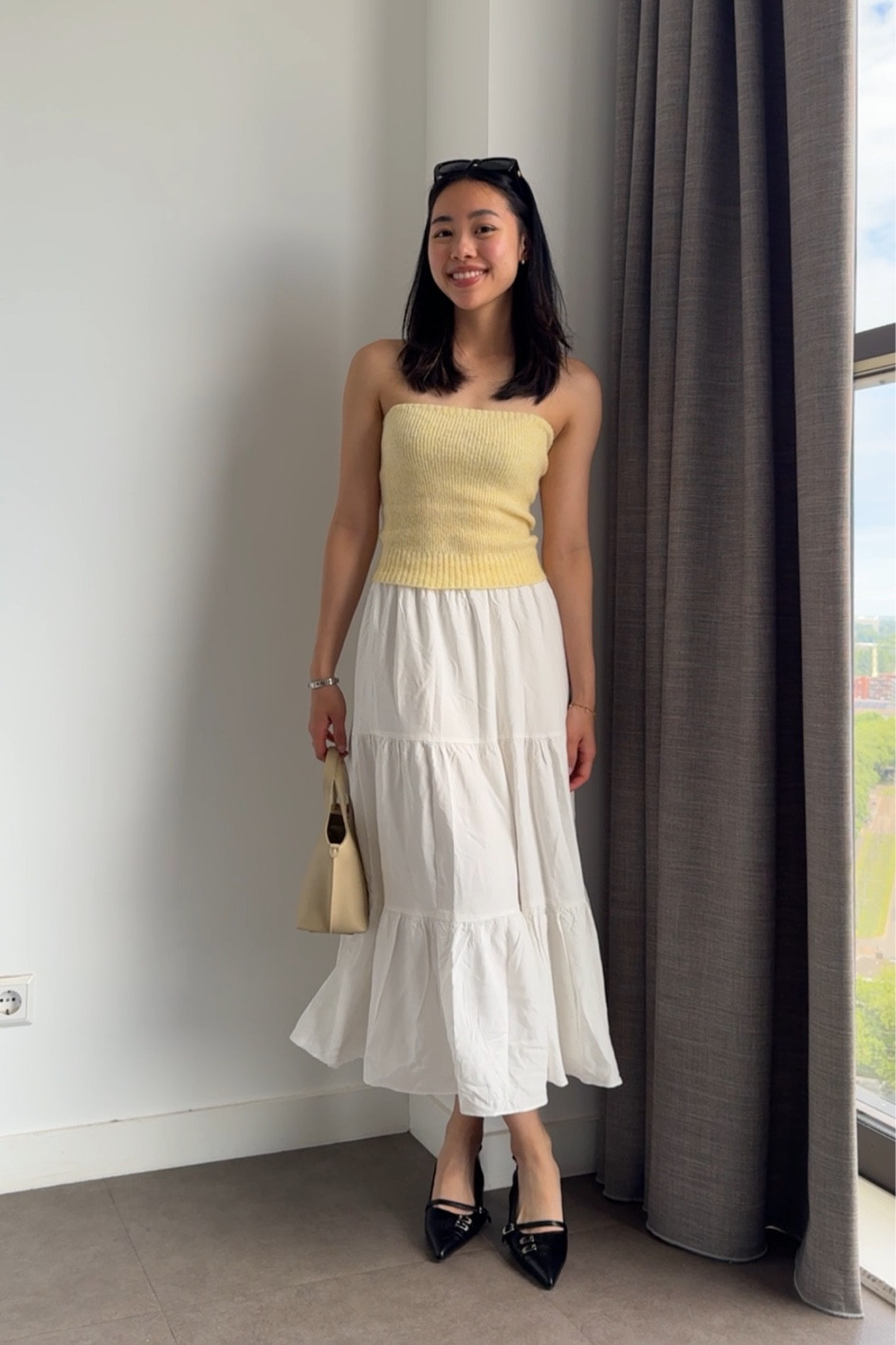 Easy & cute summer outfit:
Yellow tube top from Sezane,
White cotton tiered skirt is sold out but I linked a similar one from Uniqlo,
Bag and shoes are from Korean brands, available via WConcept

#LTKFindsUnder100 #LTKSummerSales #LTKFindsUnder50