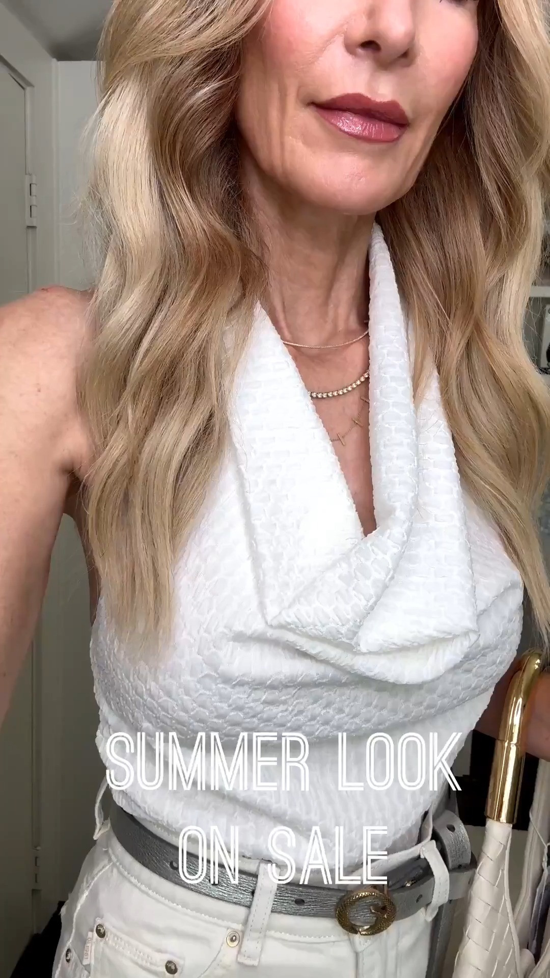 Loving this chic all-white summer look from @NordstromRack! 🤍 This ivory halter top is so flattering and tastefully sexy, and I paired it with these high-waisted ivory wide-leg jeans that have the most amazing fit. Finished the look with this gorgeous designer-inspired bag for an effortlessly elevated outfit. The best part? Everything is on sale! These are timeless pieces you’ll wear all summer long. Everything runs true to size—I’m wearing an XS in the top and a size 24 in the jeans. #RackScore #NordstromRackPartner 

#LTKOver40#LTKSaleAlert 

 

#LTKgrwm