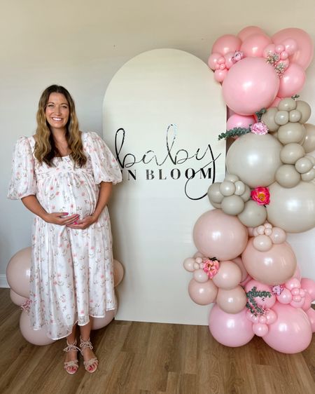 We were all gushing over my little sister’s baby shower dress and when I found out it was UNDER $100 I had to post it here for you guys! Also comes in a blue pattern!! When her MIL saw her she said omg you look like a princess and started crying- it was the sweetest thing ever!!! But she really did look like a princess!!! 

#LTKBump #LTKBaby #LTKFindsUnder100