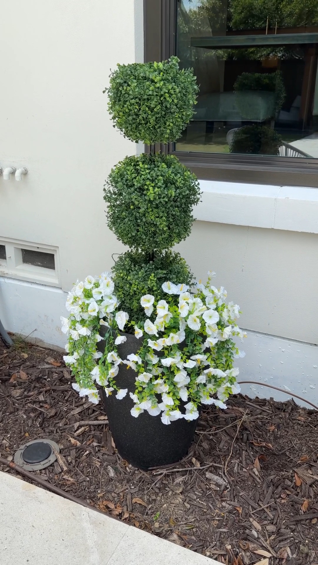 Early Prime Day deals have me refreshing Amazon way too often, and this one was absolutely worth it — a faux spiral boxwood topiary tree down to $34.99 from $76.99, and I paired it with artificial white outdoor flowers at the base for the most realistic, low-maintenance curb appeal. Both are Amazon finds and together they look like something you’d see in a professionally landscaped front yard without any of the upkeep. If upgrading your outdoor space with faux greenery is on your summer home list, these Prime Day deals are the ones to grab.

#LTKSaleAlert #LTKHome