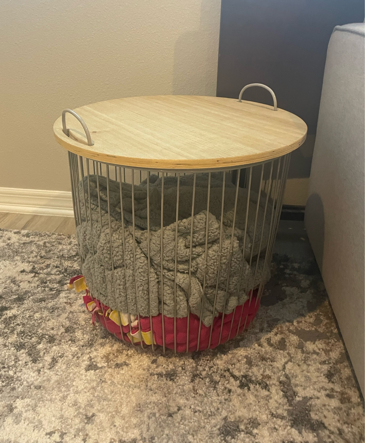 We use this as a blanket basket but can be multi-purpose. Works great as an end table as well. Target find. Under $50  

#LTKHome #LTKFamily #LTKFindsUnder50