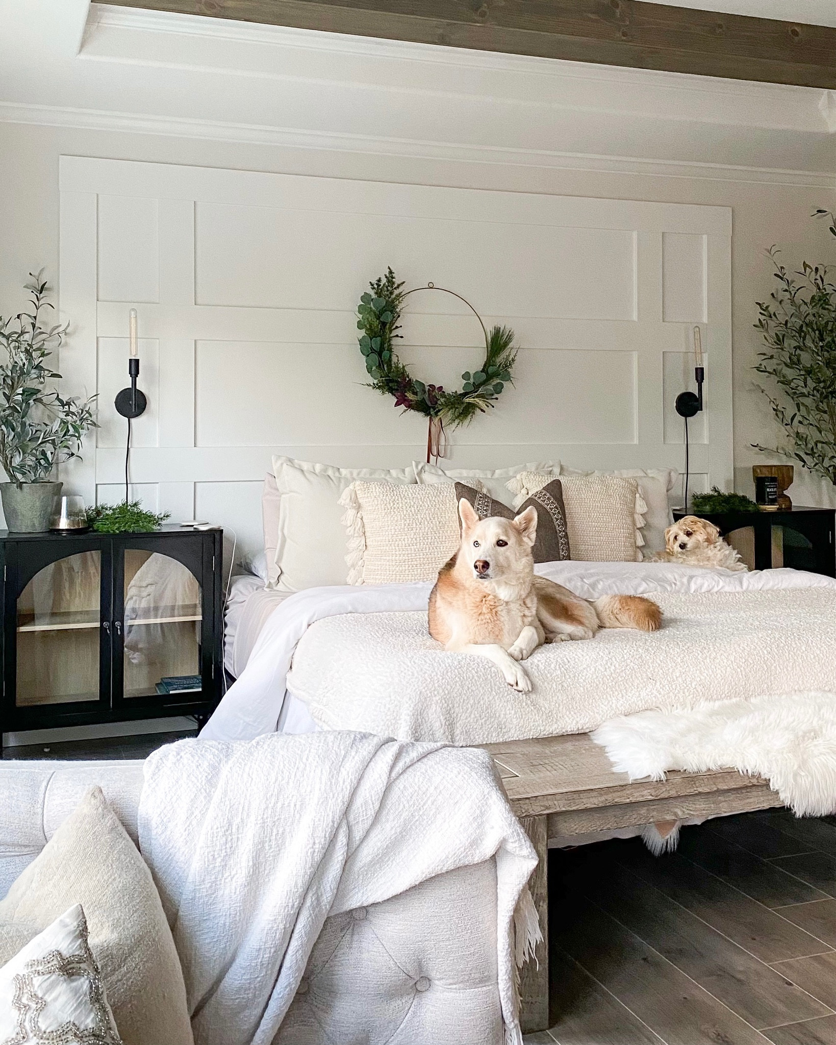 Shop my bedroom with a touch of holiday decor! Get a closer look in today’s reel on Instagram @AmandaFallonHomes ☺️🎄

Bedroom holiday decor. Wreath. Olive tree. White bedding. Ivory arm chair. Faux fur rug. Wooden bench. Black cabinet. Cabinet nightstands. 

#LTKhome #LTKsalealert #LTKHoliday
