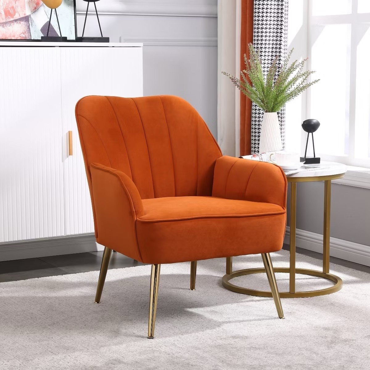 Add a pop of color to your space 🍊✨
This bold orange velvet accent chair brings warmth and personality to any room. The soft velvet texture, gold legs, and retro-inspired design make it both cozy and chic — perfect for a reading nook or statement corner.