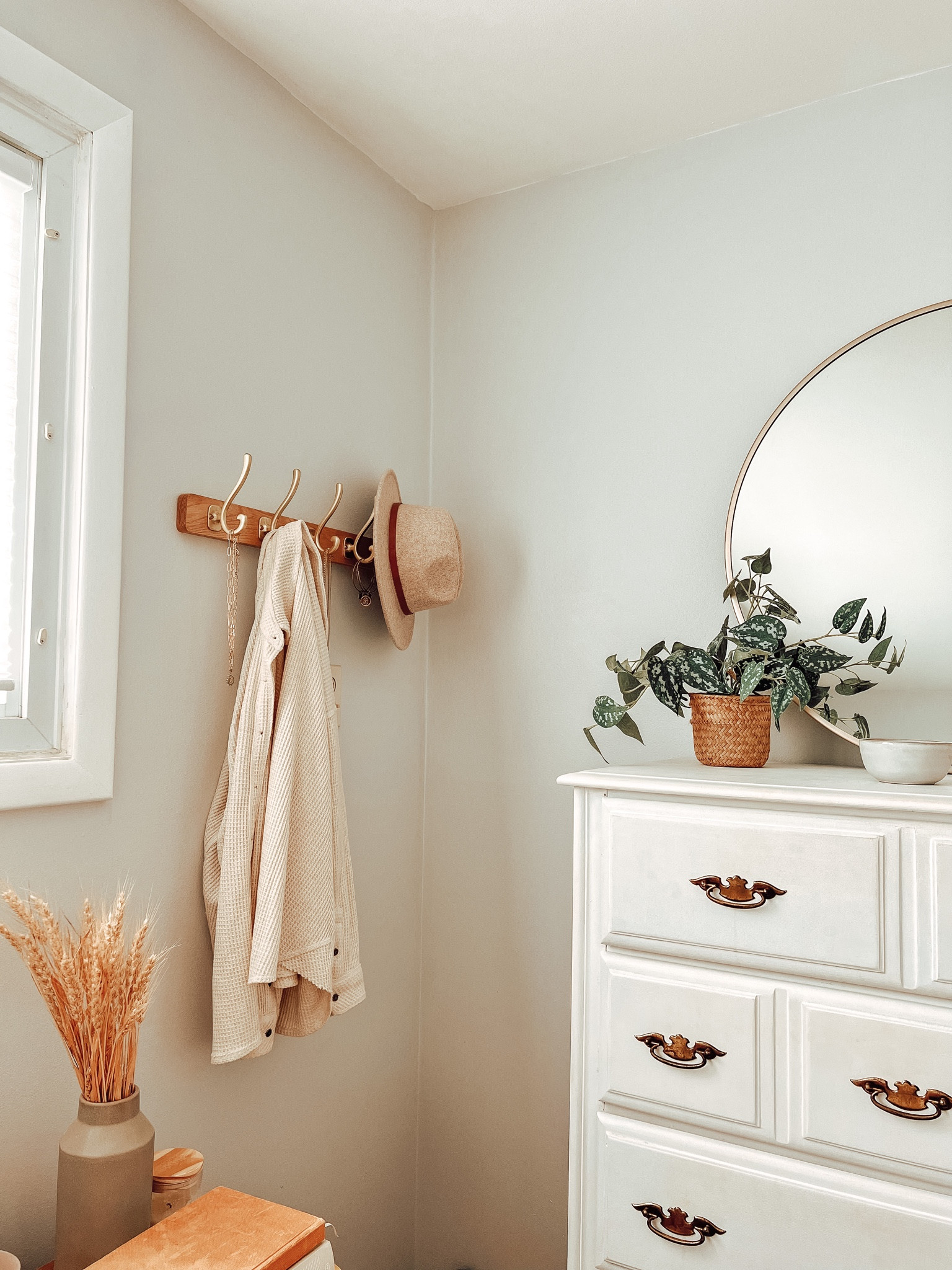 Bedroom gold hooks
Neutral night stand

#LTKhome