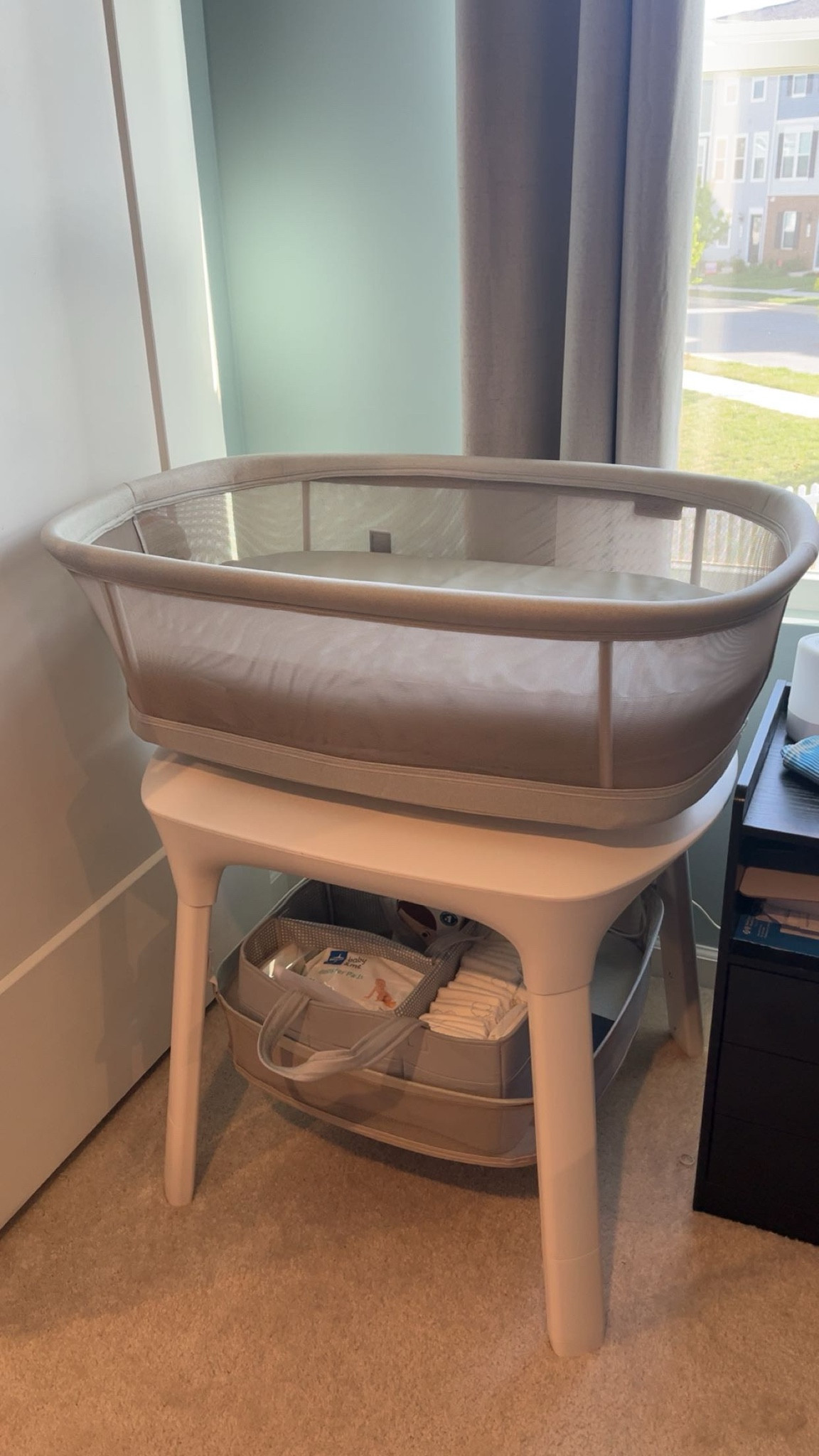 Our next baby spot is the bassinet in the master bedroom, which is both a sleeping and changing station for our newborn. The bassinet is self-rocking in a variety of movement patterns meant to mimic parents’ rocking. (Our toddler NEVER slept in his bassinet, so this has been life changing.) We store all of the newborn’s diapers, wipes, and swaddles in a caddy below. We also have an oval changing pad that fits perfectly inside the bassinet and makes nighttime diaper changes much easier!

#NurseryNeeds

#LTKmomlife #LTKBaby #LTKHome