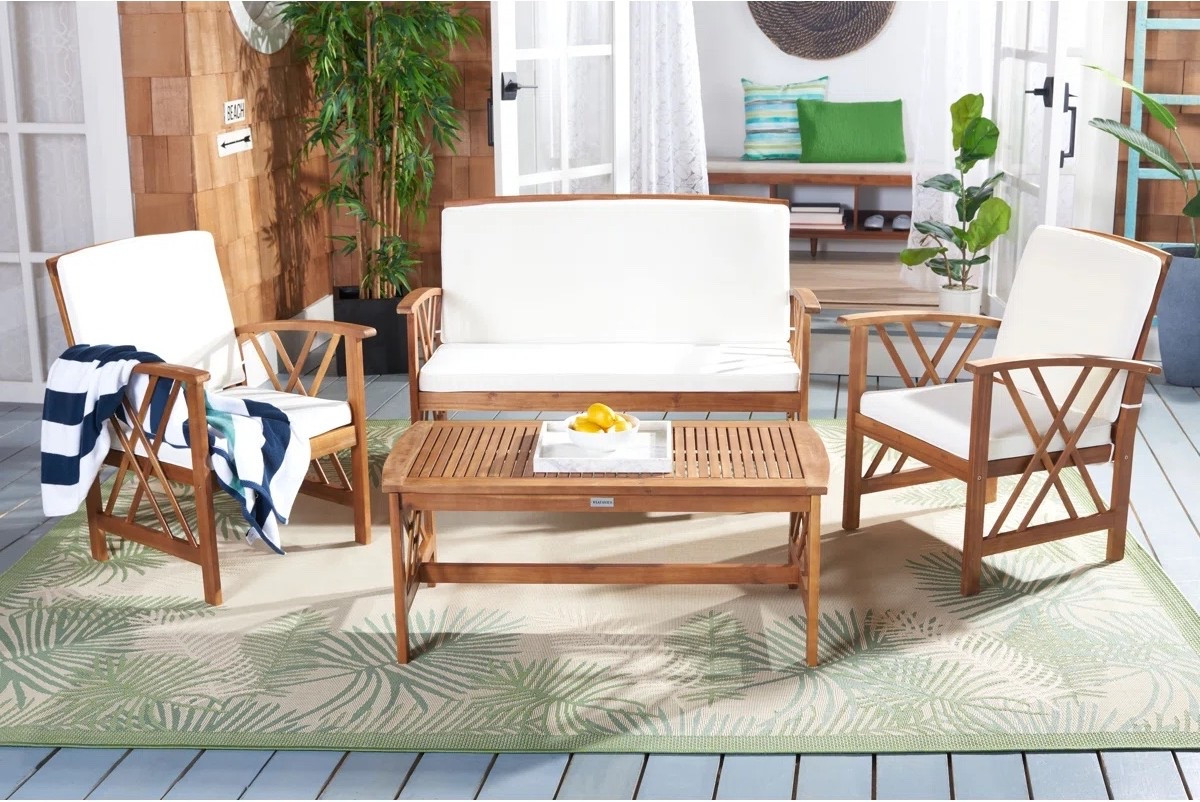 This acacia wood patio conversation set from Wayfair is such a beautiful outdoor entertaining setup for patios, porches, and backyard spaces. The warm wood frame paired with the neutral cushions gives it that relaxed coastal and modern farmhouse feel while still looking timeless and elevated. Love that this 4-piece set creates the perfect cozy space for morning coffee, summer hosting, or relaxing evenings outside. Plus, it’s currently part of the Wayfair Memorial Day Deal event.

#LTKSaleAlert #LTKHome