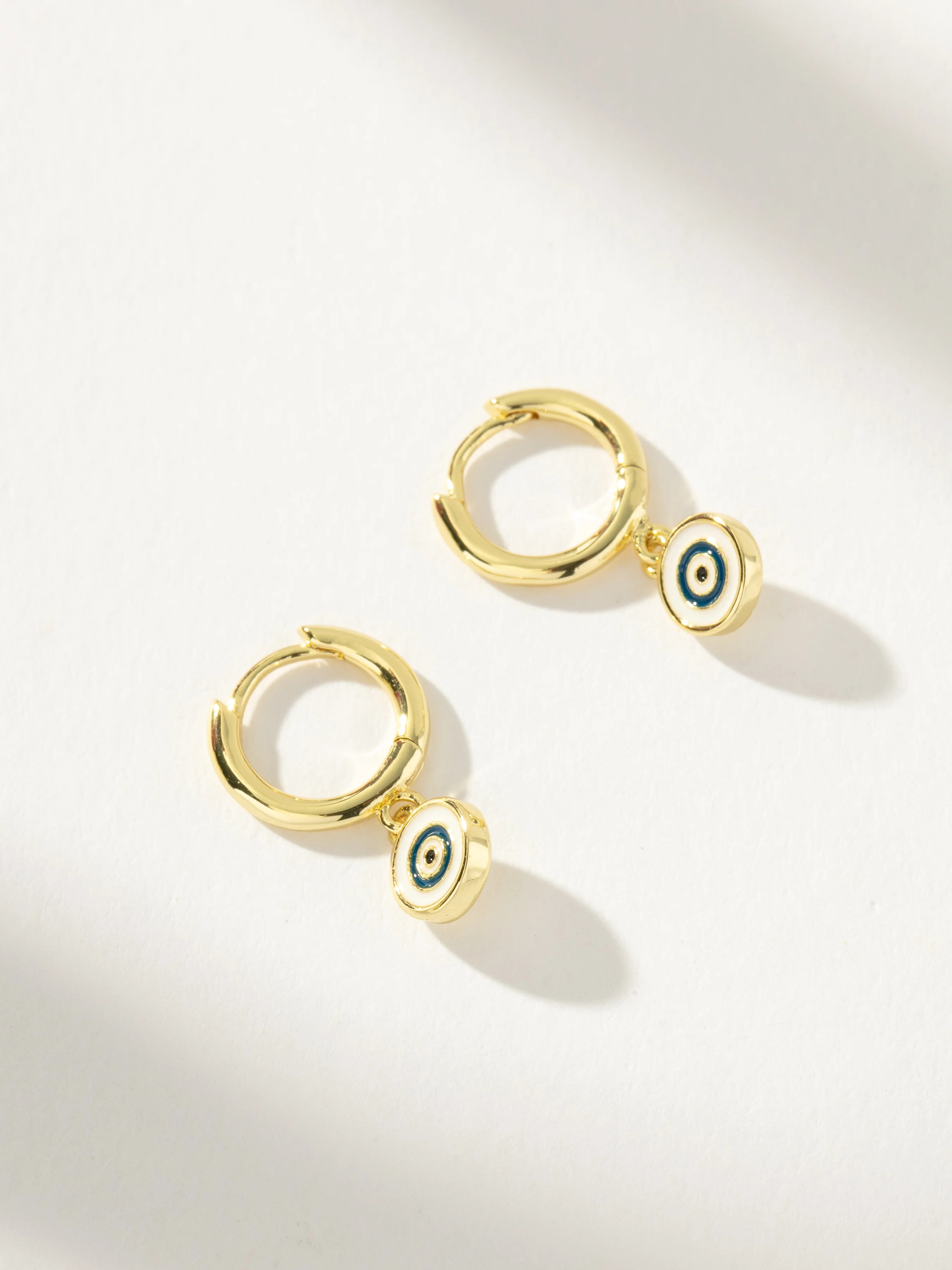 Simple Evil Eye Huggie Earrings | Uncommon James