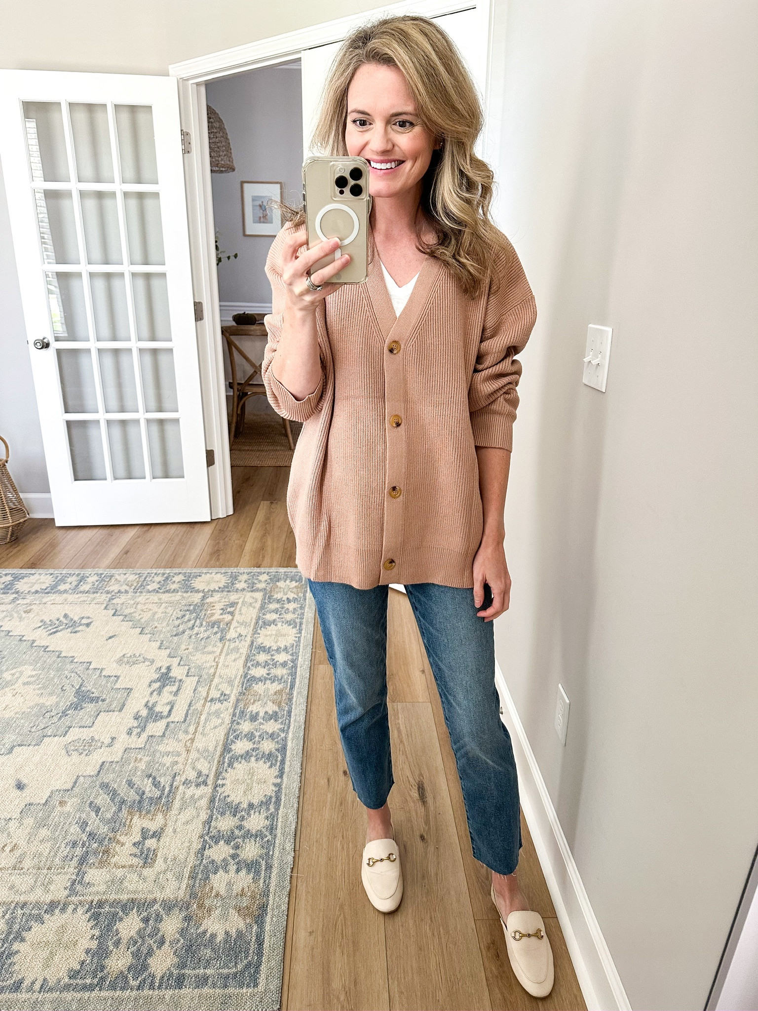 Oversized button down cardigan. It comes in a ton of colors - I am wearing the size small

#LTKfamily #LTKSeasonal #LTKbump