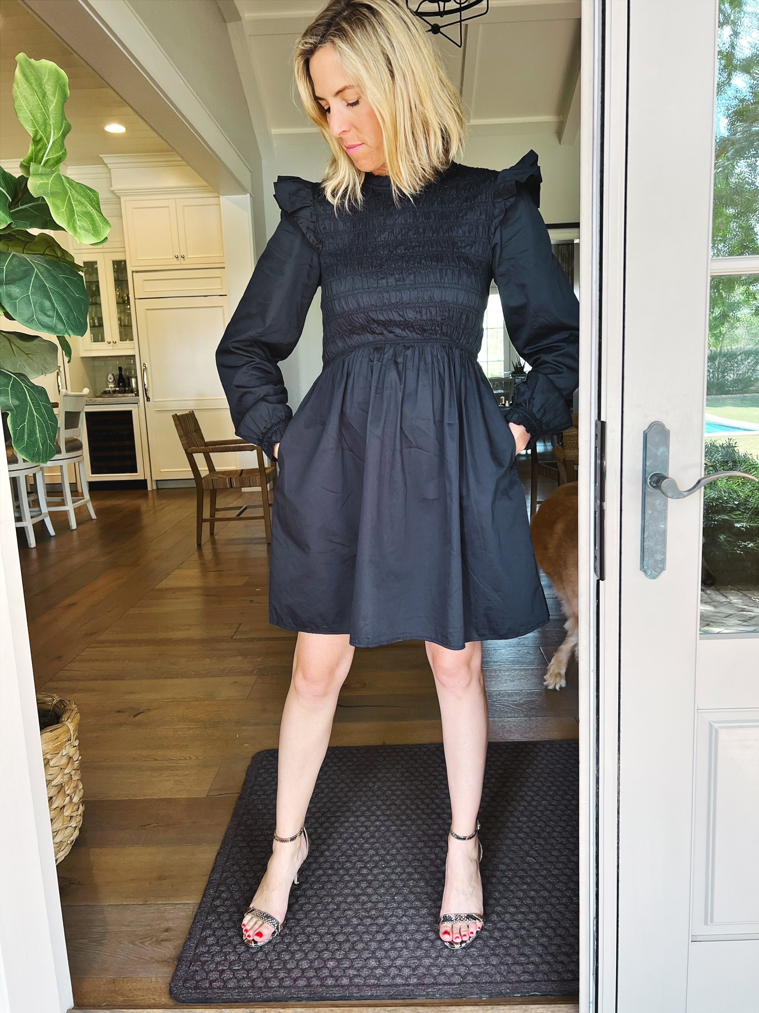 Cute little black dress from Gap. Love the smocking and ruffle sleeve. Pair with boots or a heel. Runs tts. Laura wearing a small here. 

LBD 
Little black dress
Fall fashion
Fall photo looks 

#LTKSeasonal #LTKstyletip #LTKunder100