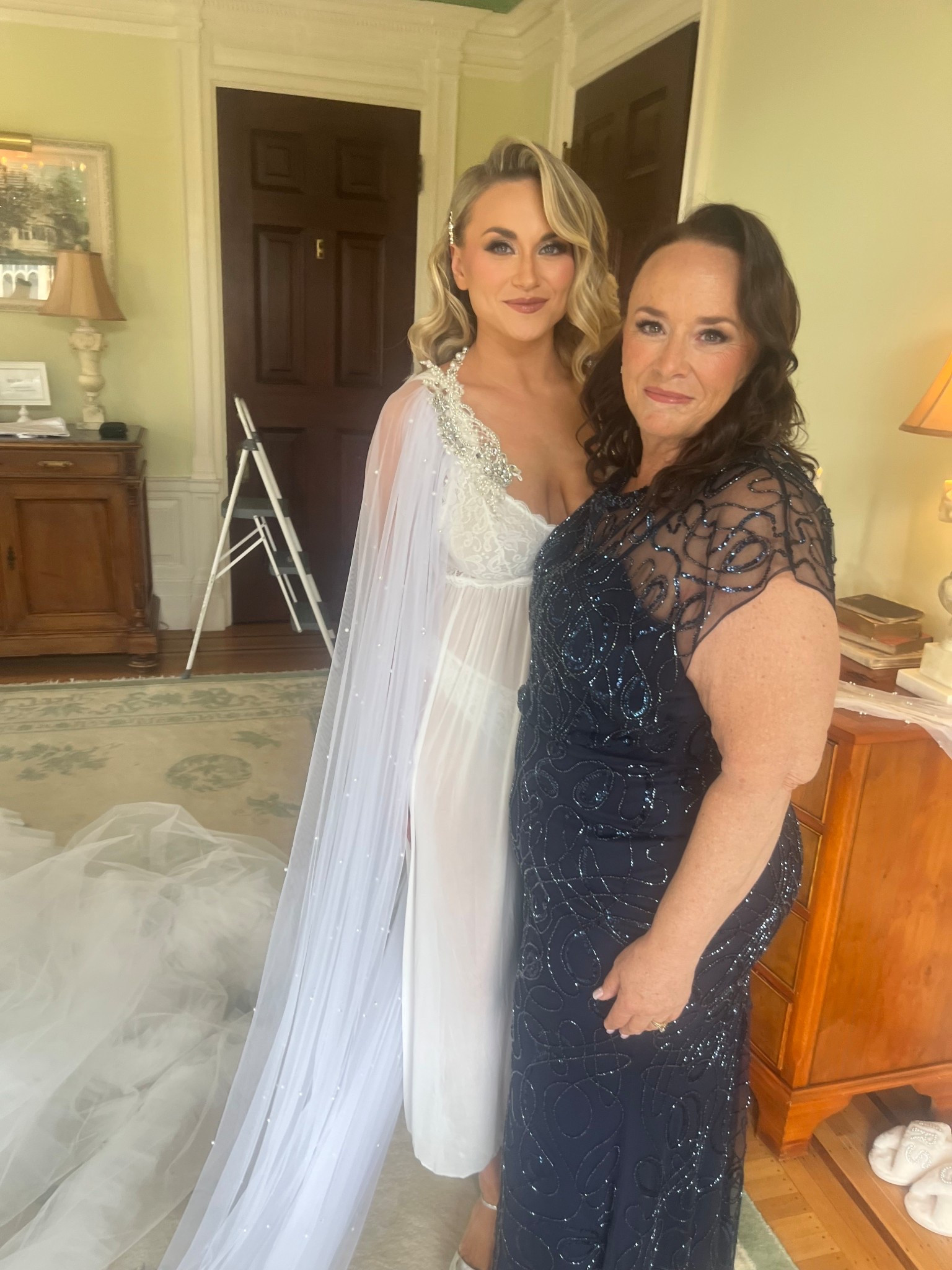 It may be unclasped here but that didn’t stop this robe from shining through and being a show stopper. 

I am obsessed with this cape! 

#LTKFindsUnder50 #LTKWedding #LTKStyleTip