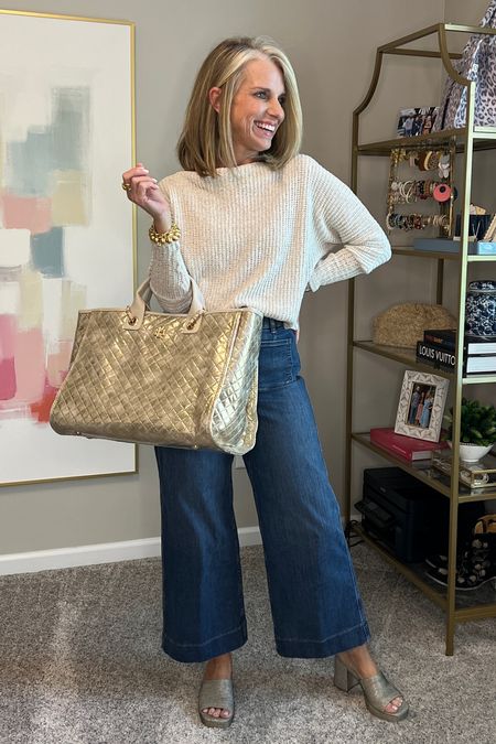 So much to love. Use code LISAXSPANX on these pull in wide leg crop jeans. I sized down to a small. (Normally I get medium pants from Spanx) 

Use code COAST on these sandals. They’re super comfy and cute 

Use LISA10 on sweater. Wearing XS 

#LTKstyletip #LTKover40 #LTKfindsunder100