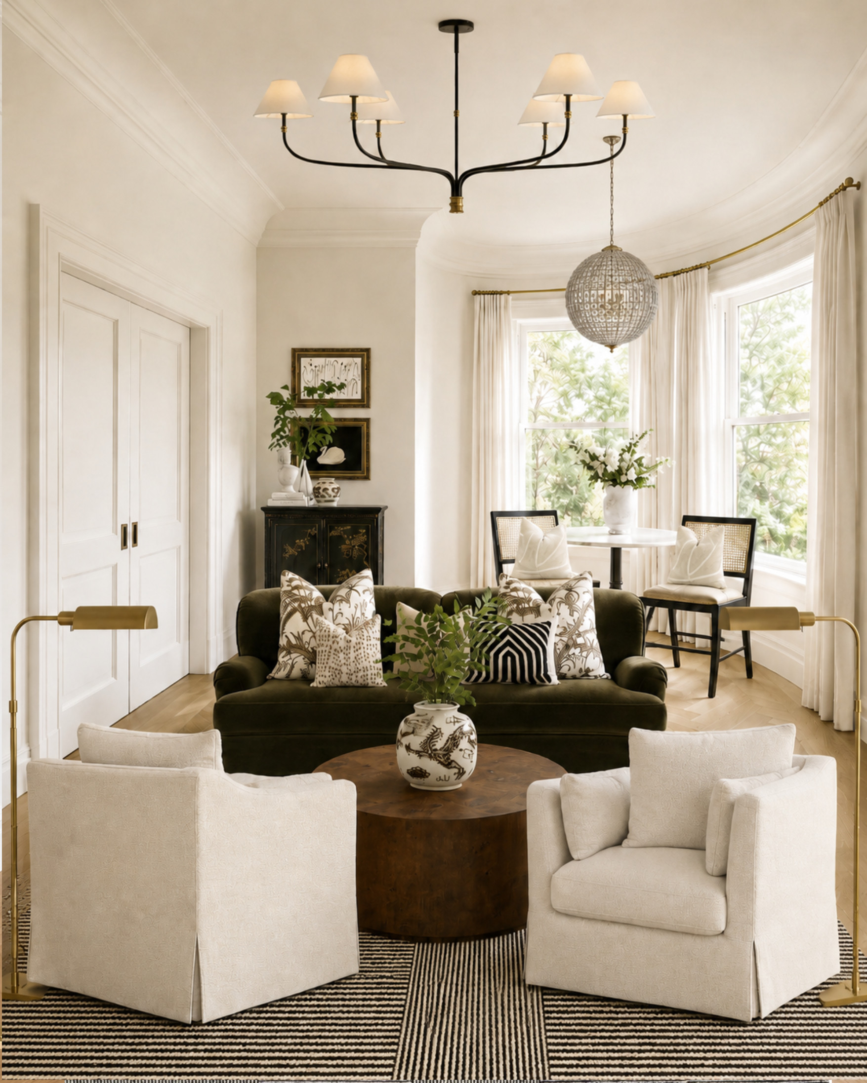 A room that feels collected, layered, and polished without trying too hard.

The mix of skirted chairs, a dark velvet sofa, warm wood, black accents, brass lighting, and patterned pillows gives this space that classic-but-interesting look I always come back to. It feels elevated, but still comfortable enough to actually live in.

I love this setup for anyone trying to make a living room feel more finished: start with timeless upholstered pieces, add contrast through darker furniture or lighting, then layer in pattern, texture, and greenery so it doesn’t feel flat.

I may receive a commission when you shop through my links. 

 #LTKHome