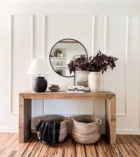 Entryway. Fall entryway. Wood console table. Waterfall console. Black lamp. Rattan baskets. Braided baskets. Textured vase. Fall decor. Neutral decor  

#LTKhome #LTKSeasonal #LTKunder100