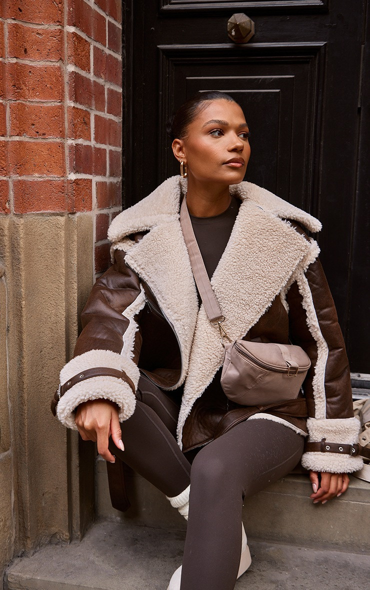 Brown Borg Trim Belted Hem Faux Leather Aviator Jacket | PrettyLittleThing UK