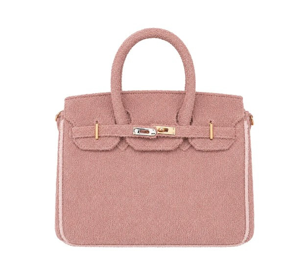 🩷 Dusty Rose Terry Handbag

Looking for that luxury-inspired look without the luxury price tag? This dusty rose terry handbag is a chic, Hermès-inspired piece that blends timeless elegance with everyday practicality. Crafted from soft plush terry fabric with structured top handles and polished hardware, it's the perfect accessory for brunch, travel, errands, or a day at the golf course.

Its compact design is ideal for carrying your daily essentials while adding a sophisticated pop of color to any outfit. 

 #LTKmomlife #LTKSeasonal #LTKOver40