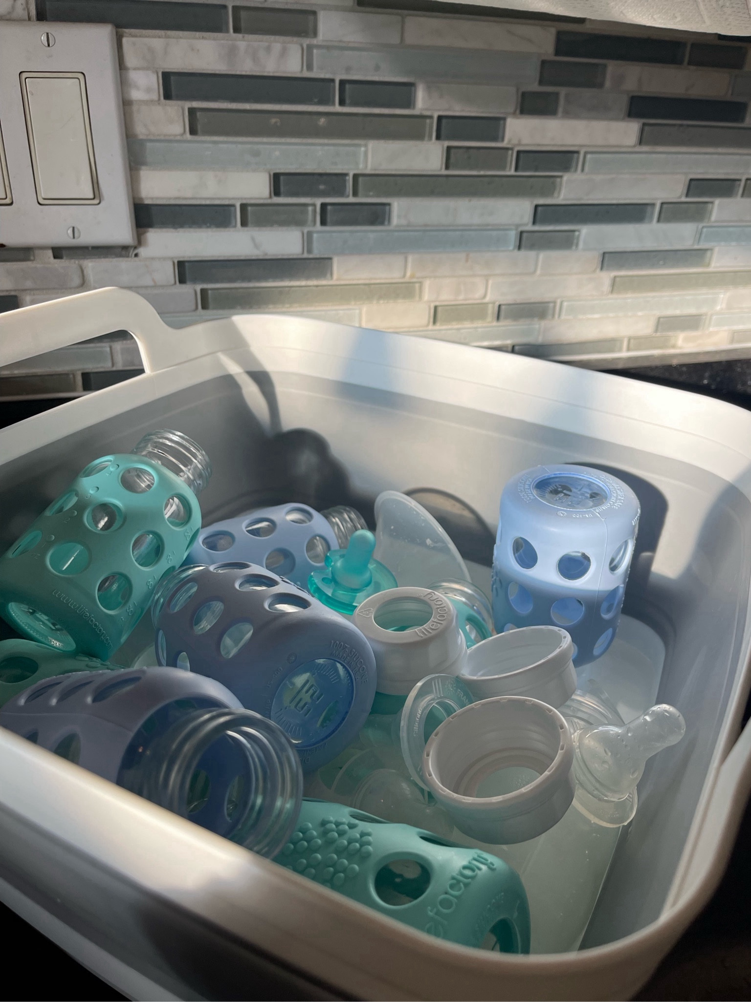 The dreaded bottle cleaning but this collapsible kitchen tub has been a life savor! Helps keep the babies bottles/my pump parts out of the regular sink and lets them soak separately to keep things sanitary! 

#LTKbaby #LTKfamily #LTKhome