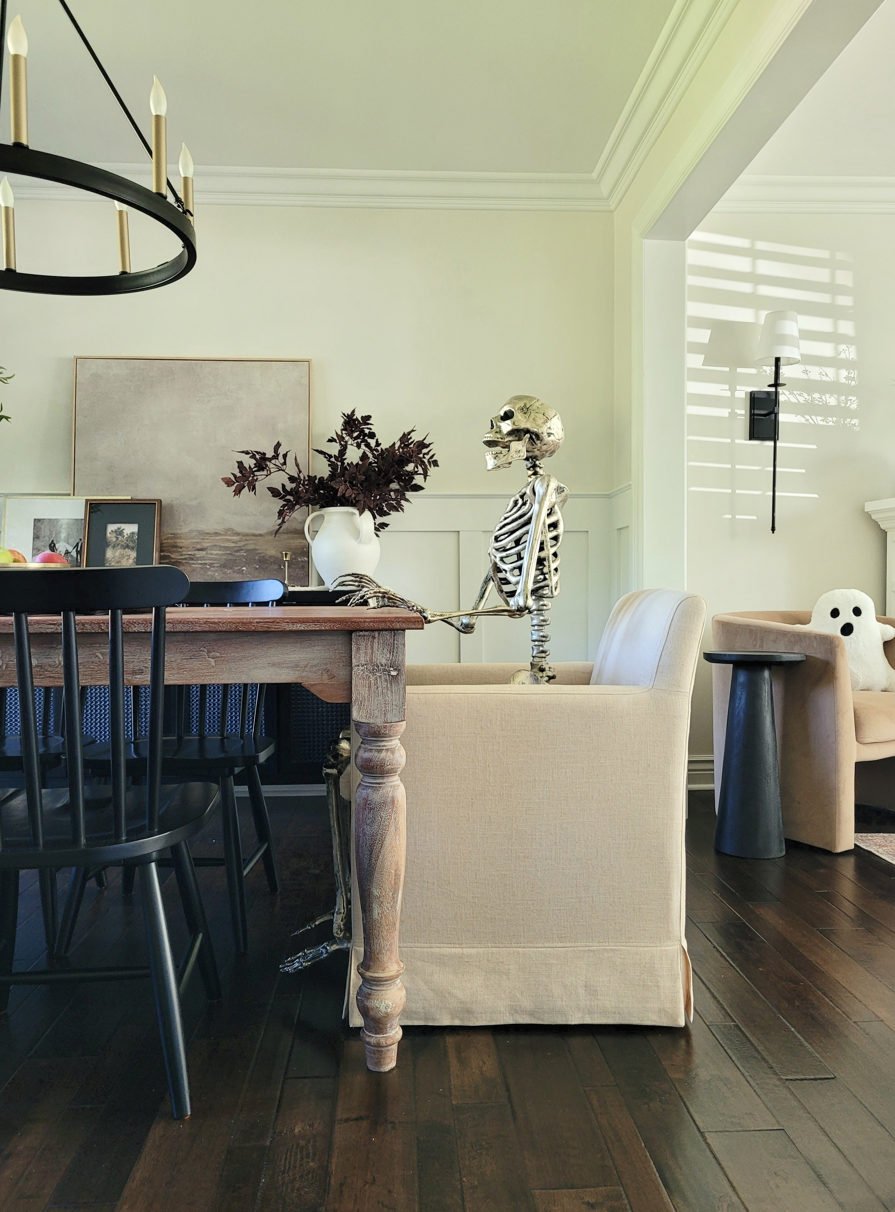 Halloween decorations- keep our simple with fall stems, a skeleton,  or a ghost pillow! Gold skeleton,  Halloween,  spooky decor, dining room,  living room,  sconce,  accent chair,  barrel chair

#LTKHalloween #LTKFindsUnder50 #LTKHome