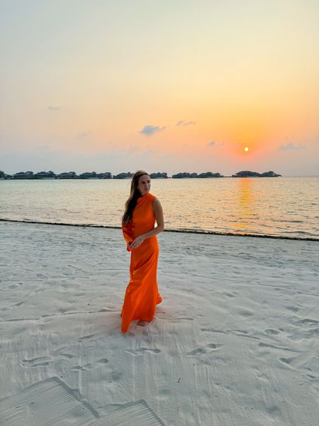 This dress made such a statement. The color and the fit popped along the beach but would also be gorgeous for a formal wedding guest look. I loved everything about it. 

#halston #maxi #gown #whatiwore #weddingguest #weddingguestlook #maxidress #statementdress #gown #blacktie #beachstyle 

#LTKtravel #LTKstyletip #LTKSeasonal