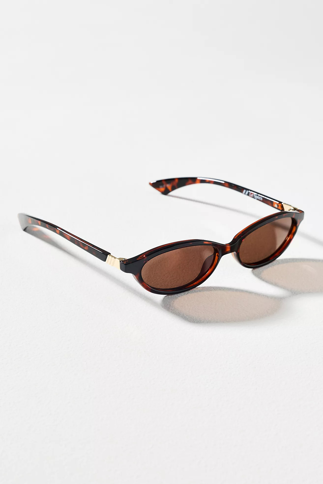 Le Specs Duskfall Slim Oval Sunglasses | Anthropologie (US)