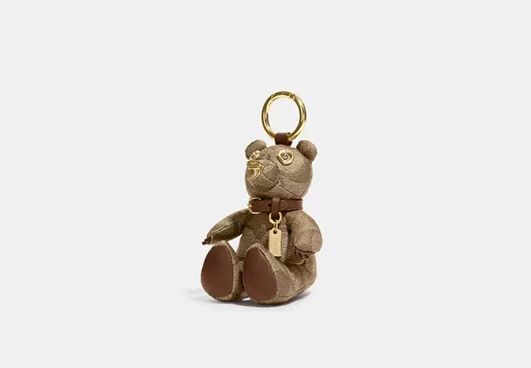 Coach Outlet Bear Bag Charm In Signature Canvas - Beige | Coach Outlet US