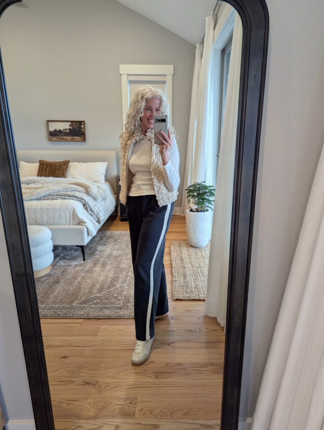 I've said it before, I love a track stripe pant! Paired with a rhinestone tee and a fun vest, comfy but not boring.My new sneakers are ridiculously comfortable—lots of room for toes and they have been wonderful for my current bout of plantar fasciitis. I got the gold, it's a  little silver, a little gold… somehow goes with everything! #plantarfasciitis #over60 #metallicsneakers #over50

#LTKSaleAlert #LTKFindsUnder50 #LTKootd