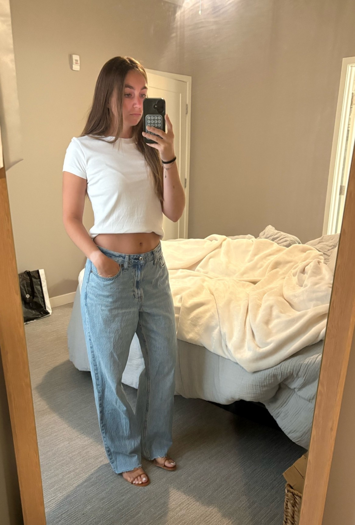 A white tee and light wash jeans might be the easiest outfit formula you’ll ever put together 🤍

I’ve been reaching for these Abercrombie jeans nonstop because they’re comfortable, easy to style, and instantly make even the simplest outfits feel put together. Pair them with a classic white tee and sandals, and you’ve got an outfit that works for everything from running errands to grabbing coffee or meeting friends.

Linked similar pieces including:
• White crewneck tee
• Abercrombie light wash jeans
• Brown slide sandals
• Everyday capsule wardrobe basics

These are the kinds of timeless wardrobe staples that I’ll wear year after year because they’re versatile, comfortable, and never go out of style.

#LTKStyleTip #LTKSeasonal #LTKunder50
#abercrombie #everydaystyle #capsulewardrobe #casualoutfit #summerstyle

#LTKootd #LTKSeasonal #LTKSaleAlert