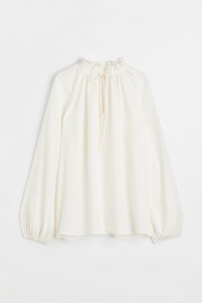 Blouse in softly draped woven fabric. Low, ruffled collar and V-shaped opening at front with narr... | H&M (US + CA)