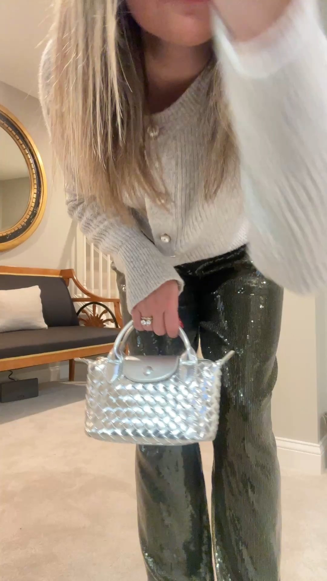 A little look at my OOTD for family Christmas Eve at home! This would totally work for a cozy NYE outfit at home or a friends house, too.
My pearl cardigan is from Abercrombie a few years back, so I found some similar styles. My green sequin pants, silver ballet flats that feel like slippers, and silver bag are all super affordable and still in stock! 

#LTKHoliday #LTKootd #LTKSeasonal