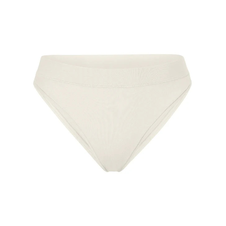 COTTON JERSEY CHEEKY TANGA | SKIMS (US)