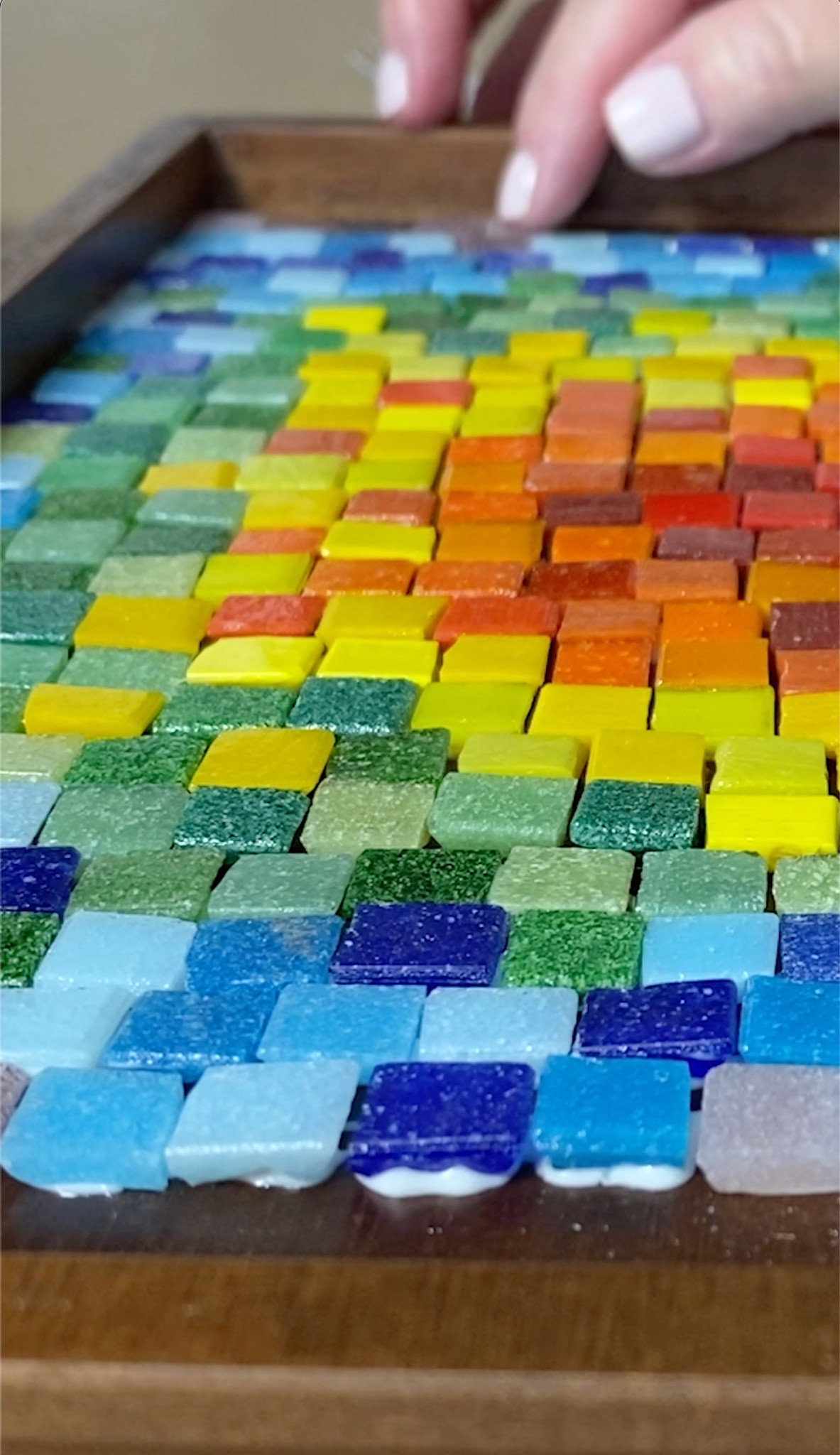 Sharing a handmade gift idea: a mosaic tray. 🌈 This one features a solid wood tray with a gorgeous mix of rainbow glass tiles. 🌈 Full tutorial on my YouTube channel. 🌈 For mosaic tips, tutorials, inspiration, and so much more please visit my YouTube channel: YouTube.com/julieweilbacher. Follow @julieweilbacher on Instagram for all things mosaic art. #traydecor #mosaictray #brownwoodtray #tablescape #glassmosaictile #tileart 

#LTKFindsUnder50 #LTKHome #LTKGiftGuide