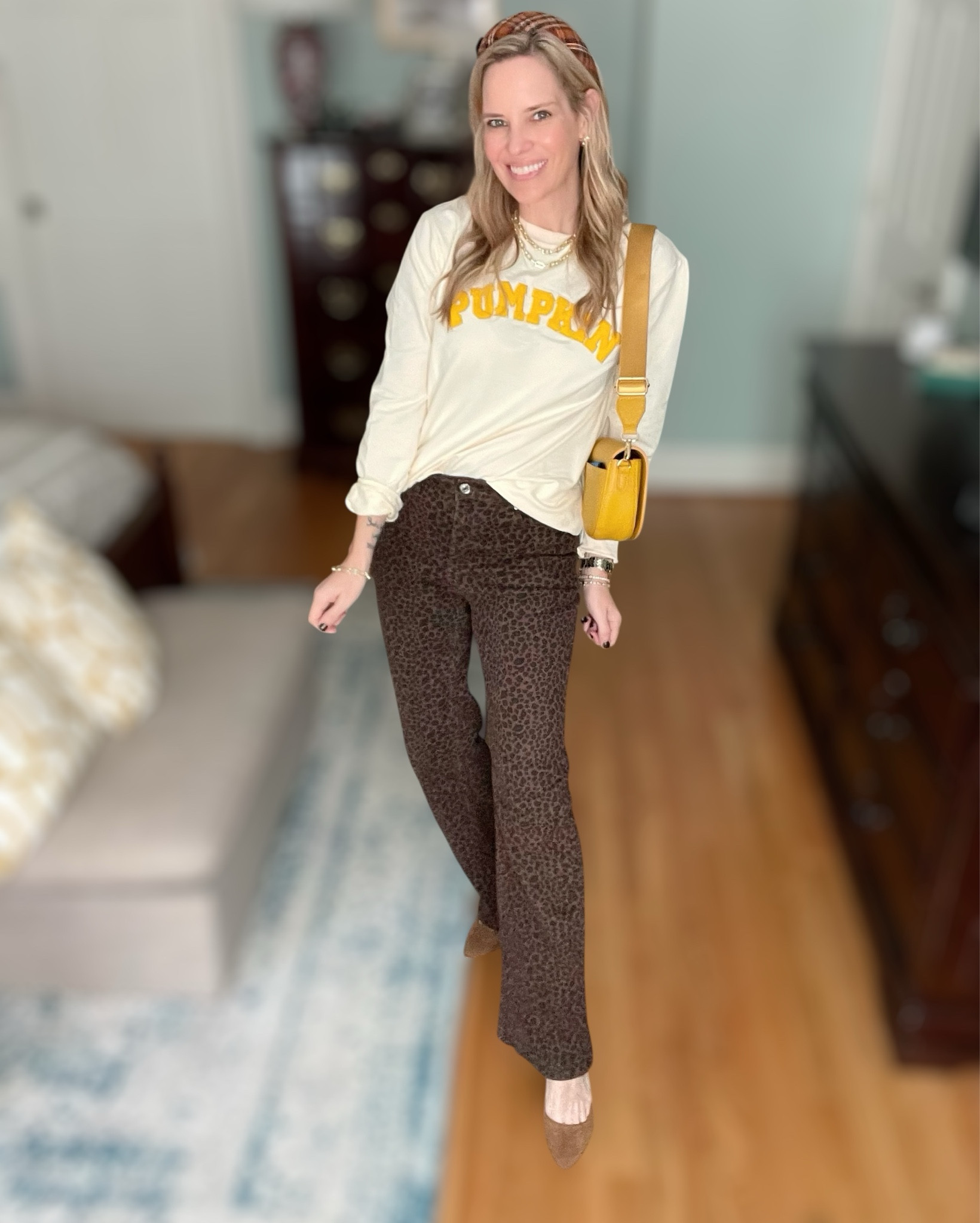 🍂 Pumpkin spice & everything nice vibes today! I styled this cozy “Pumpkin” sweatshirt with chic high-waisted leopard flare jeans for the perfect casual yet elevated fall look. I added a pop of color with this yellow crossbody bag, neutral block heels, and gold layered jewelry for that extra sparkle ✨.

This outfit is perfect for fall activities, pumpkin patch days, casual Fridays, or a cozy coffee run. The retro graphic sweatshirt gives playful seasonal energy while the flares + heels elongate your legs for a flattering fit. I love how the headband + jewelry stack tie everything together for an effortlessly chic autumn style. 🍁

✅ Shop exact & similar finds linked below so you can recreate this affordable fall outfit!

⸻


fall outfit 🍂 | pumpkin sweatshirt | leopard flare pants | casual fall style | cozy fall fashion | affordable fall outfit | fall graphic sweatshirt | trendy fall looks | fall mom style | pumpkin patch outfit


#LTKItBag #LTKFindsUnder50 #LTKFindsUnder100

#LTKFindsUnder50 #LTKItBag #LTKFindsUnder100