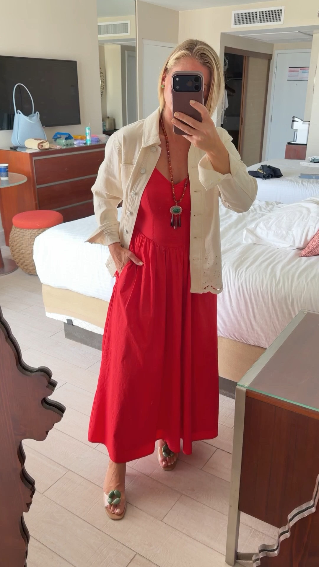 Vacation outfits should feel effortless, comfortable, and a little elevated ✨

I loved mixing this bold red dress with earthy accessories and my favorite statement necklace for dinner in Atlantis. Adding a lightweight jacket made it perfect once the sun went down.

This is exactly why I love a signature wardrobe while traveling. A few versatile pieces, layered accessories, and easy styling that still feels intentional.

#LTKTravel #LTKPetite #LTKSeasonal