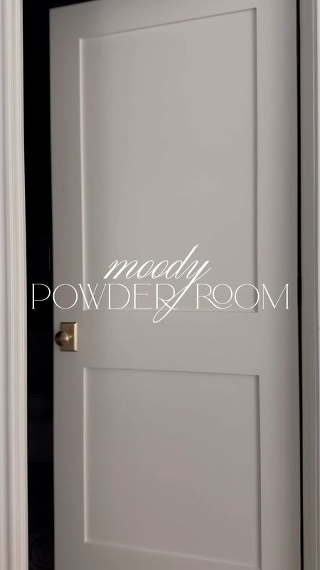 Moody powder room decor 🖤 Paint color is SW Web Gray. My black cabinet is vintage!

Amazon finds, arch mirror, brass bathroom, modern sconces, bathroom art, console sink, bathroom styling 

#LTKhome #LTKstyletip #LTKVideo