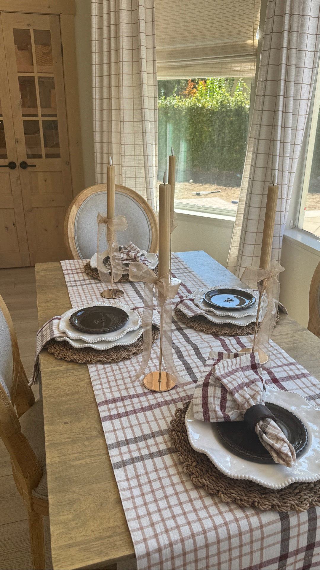 Fall Table scape 
Fall dishes 
Thanksgiving table 
White ruffle plates 
Plaid table runner 
Fall plaid napkins 
Gold candle sticks 
Battery candles 
Table top decor 
Woven placemats 
Hearth and hand 

#LTKHome #LTKParties #LTKSeasonal