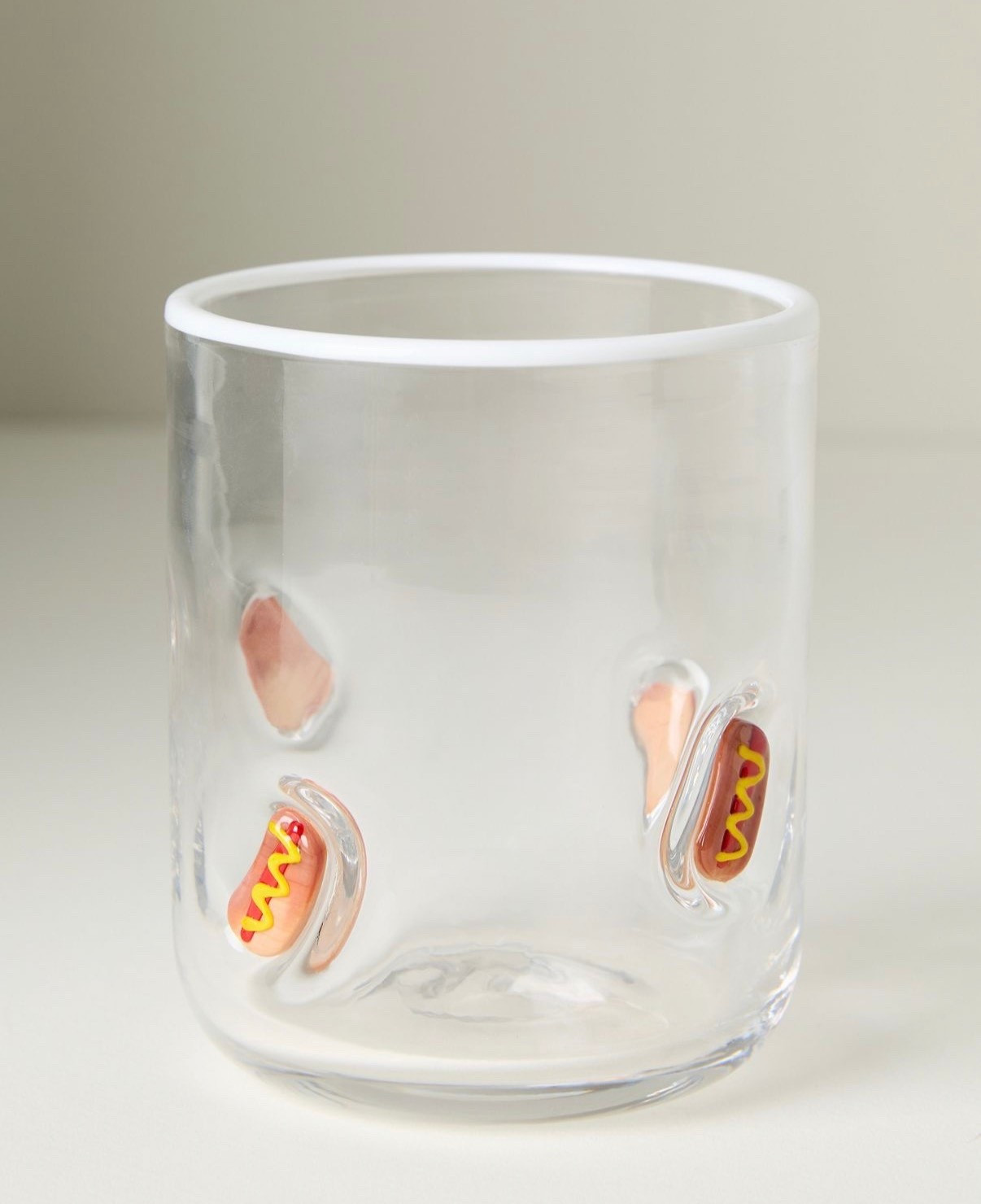 New @Anthropologie  Boardwalk juice glasses for Spring & Summer! I picked up the hot dog 🌭 one in store the other day but am loving the ice cream one too 🍦. The flip flop & Swedish fish ones are so fun! 

#LTKfoodie #LTKSeasonal #LTKHome