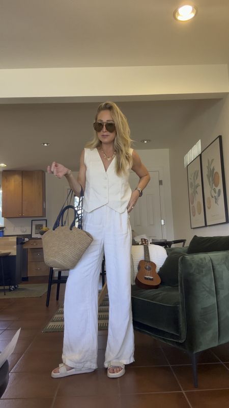 Outfit of the day! Linen trousers I wear size 24L and I’m 5’6” but like my pants longer. Vest is size XS- it runs big, linked exact sunnies bag and sandals! 

#LTKFindsUnder100 #LTKStyleTip #LTKFindsUnder50