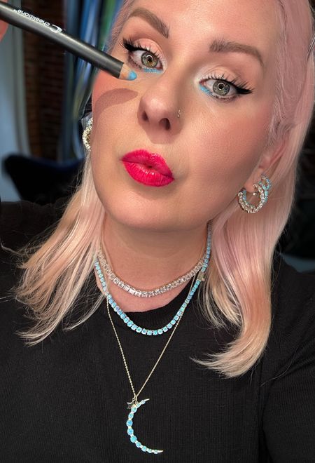 Matching your eyeliner to your jewelry💎💎💎💎💎
-Melinda Maria jewelry 
-Cheekbone Beauty Sky Blue pencil
-Too Faced Hopelessly Devoted lipstick with Pink Punch lip injection gloss.  
#jewelry
#melindamaria
#tennisnecklace
#hoopearrings
#earrings
#pinklipstick 
#toofaced 

#LTKOver40 #LTKBeauty #LTKStyleTip