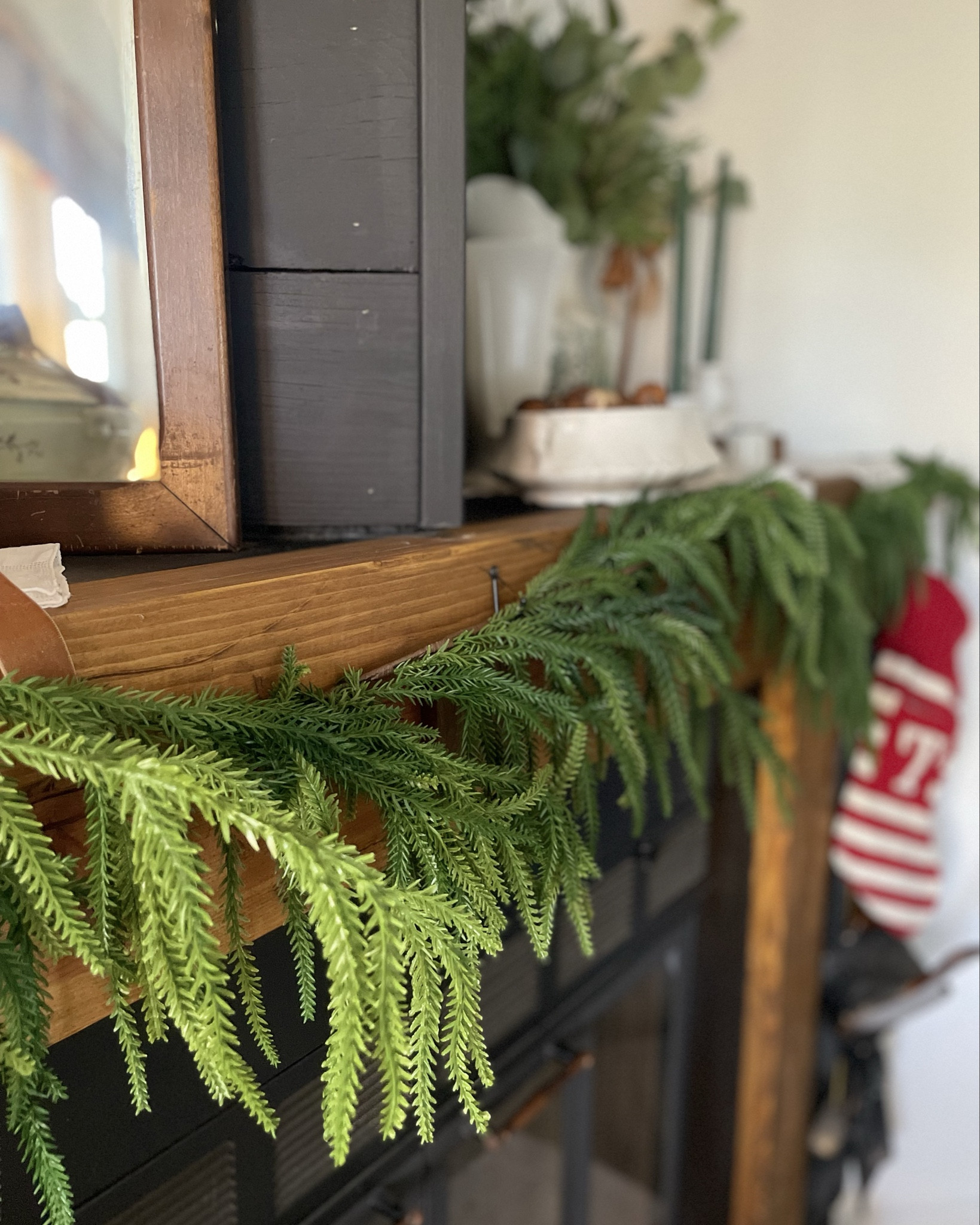 A sneak peek at my Christmas mantel and the most AMAZING garland I’ve ever purchased. The way this Norfolk pine garland effortlessly flows and drapes just the way I wanted it to is incredible!

#LTKSeasonal #LTKHome #LTKHoliday